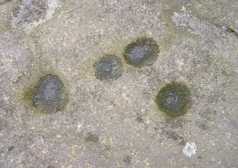 Cup marks on the upper surface of the Anvil Rock