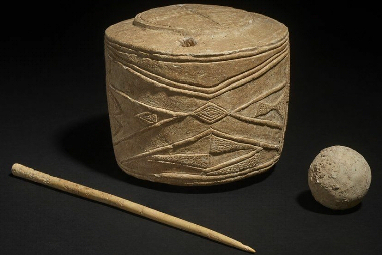 Press release of the carved chalk 'drum' found at Burton Agnes, East Yorkshire along with a carved chalk ball and bone pin