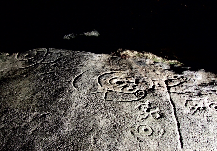 The Hanging Stones carvings lit by flash