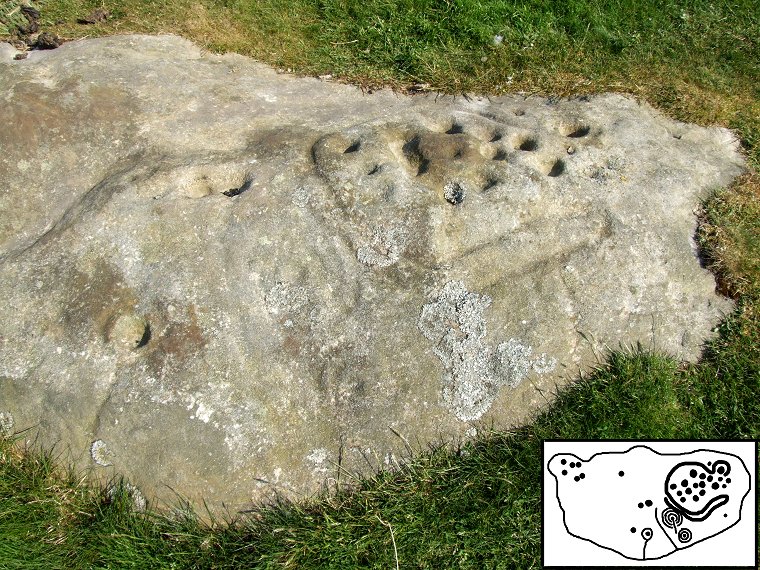 Lordenshaw 'Horseshoe' rock - detail of the carving