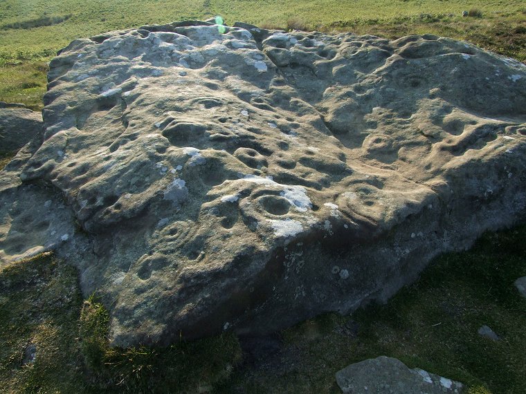 Lordenshaw - Evening sunlight across the top of the panel