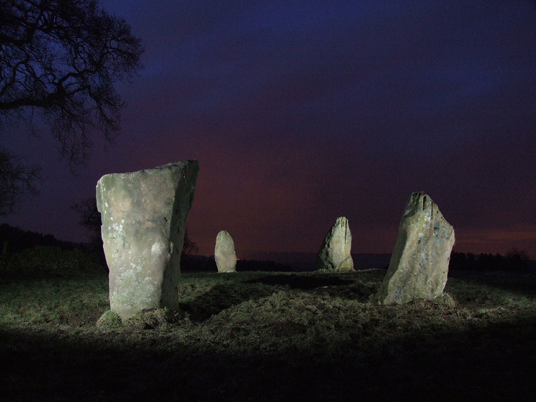 Night-time view of Nine Stone Close lit by flash